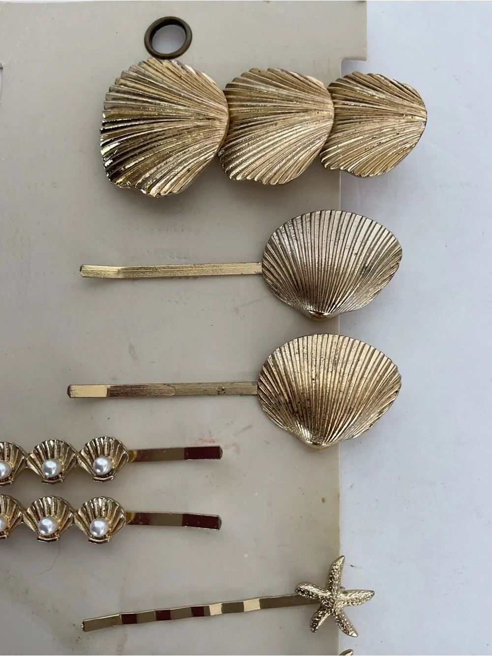 Anthropologie Gold she’ll hair clips NWT